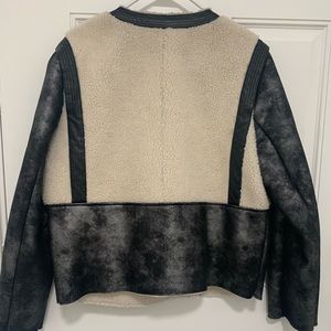 This Fabulous fur jacket is warm & cozy.